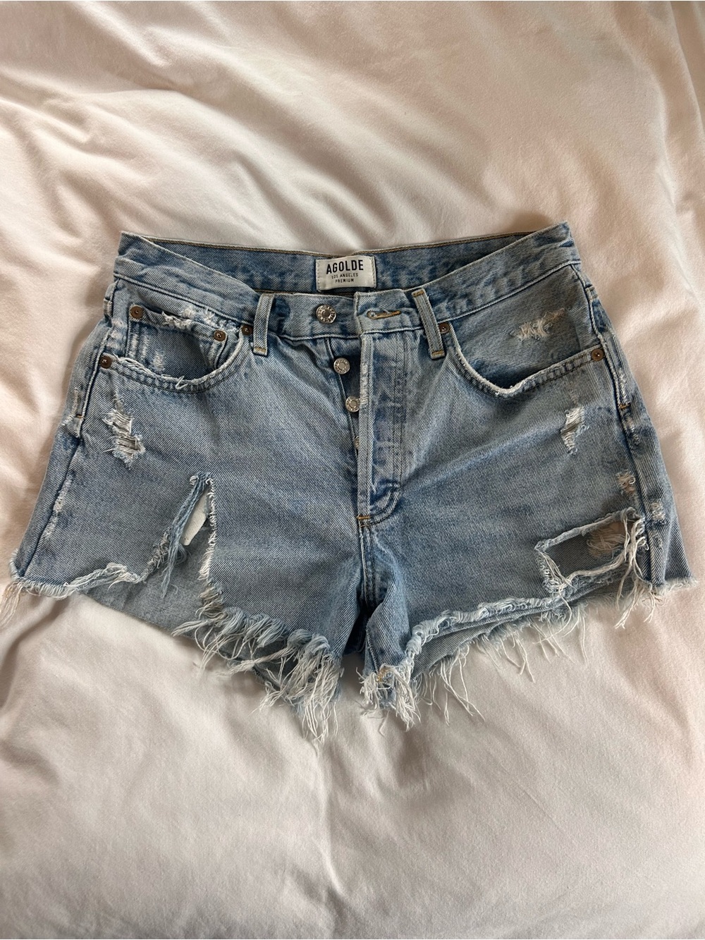 Agolde Light Wash Distressed Denim Cutoff Shorts